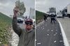 Surreal scene on a California highway: bundles of cash escape from an armored truck