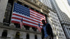 Wall Street ends lower, shaken by New York school closings